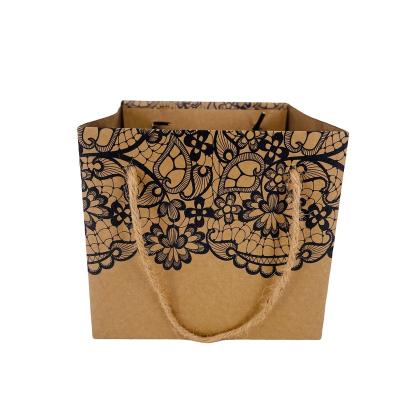 China New Design Europe Kraft Paper Bags Craft Gift Brown Packaging Paper Bag Waterproof Flower With Handle for sale