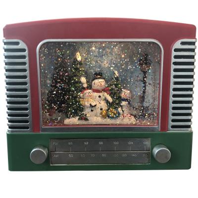 China Custom Creative Resin Music Radio Christmas Stage New OEM Rotating Led Christmas Decoration for sale