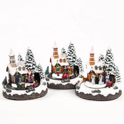 China Christmas Decoration LED Music Polyresin Lighthouse Christmas Village Scene With Moving Train for sale