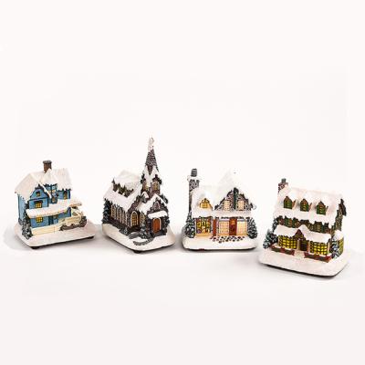 China Christmas Decoration New Products Winter Snow Scene Polyresin Christmas Village Houses Warm White for sale