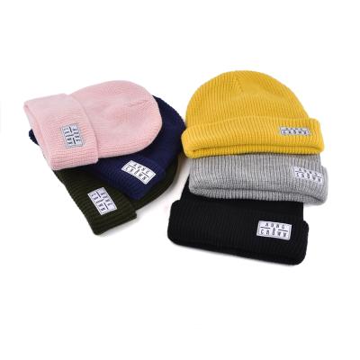 China COMMON Wholesale Unisex Designer Knit Fisherman Beanie Hats Knitted Beanie Hats Custom Winter Hats for sale