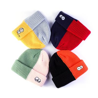 China OEM COMMON Bulk Winter Color Unisex Casual Soft Hats 2 Color Embroidered Logo Hat Two Tone Beanie for sale