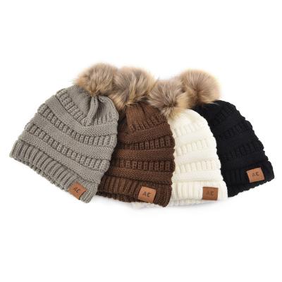 China COMMON soft headwear winter stretch cap bulky cable knit custom beanie winter hats for women for sale