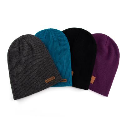 China 100% COMMON Fisherman beanie logo acrylic OEM knit hat patch custom leather beanies for sale