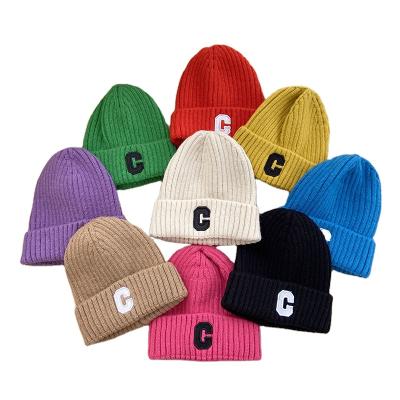 China New Candy Colors Kids Winter Casual Fashionable Warm Hat High Quality Knitted Beanies For Kids for sale