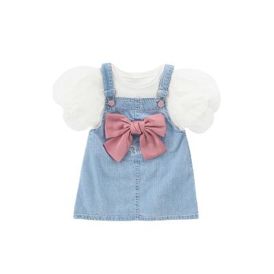 China Spring/Summer 2022 new casual A-line group girls bubble short sleeve tops one-piece bow strap denim skirt hairdresser for sale