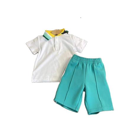 China 2022 casual new summer Korean version of the spring of the two-piece set of new boys t-shirt sleeves polo short shorts wholesale two-piece set for sale