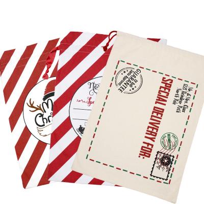 China 2021 Eco-Friendly Personalized Red White Striped XL Kids Bags Pamper Thick Cotton Snowflake Christmas Santa Sack And for sale