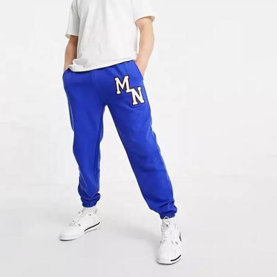 China Custom Wholesale Anti-Wrinkle OEM Jogger Sweatpants Mennace Empty Joggers With Side Pockets Embroidery Collegiate Mens Trousers for sale