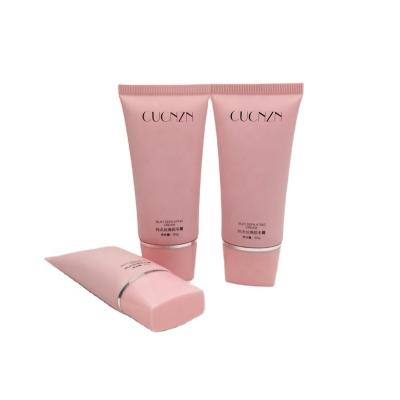 China Direct sales cosmetic packaging tube beautiful flexible and soft chinese beautyful factoty pink containers with square screw on lid tube cosmetics for sale