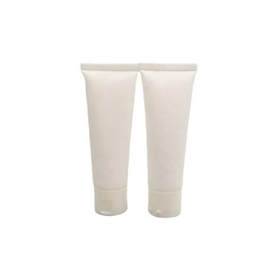 China Custom size and color accepted 100ml soft touch tube white surface 100g handling soft touch tube with flip cap for cosmetic packaging for sale