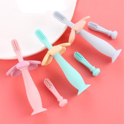 China Customized Collapsible Silicone Baby Teether Toy Kids Mouth Clean Baby Toothbrush for sale