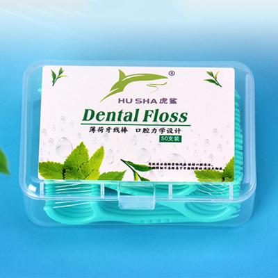 China Convenient Selection Mint Floss Wholesale 50pcs Dustproof Packaging Home Use Dental Flosser for sale