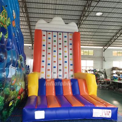 China Adults And Children Funny Sport Game Mobile Fireproof Outdoor Inflatable Climbing Wall Price for sale