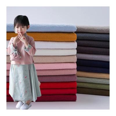 China Wholesale Plain Style Tear-Resistant Woven High Quality Imitation Linen Wrinkle Wash 100% Cotton Fabric For Summer Jacket, Shirt, Pants for sale