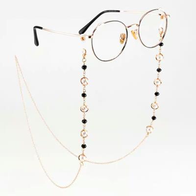 China Sports Fashion Women's Gold Chic Monocle Chains Sunglasses Reading Pearl Glass Chain Eyewears Tie Backing Neck Strap for sale