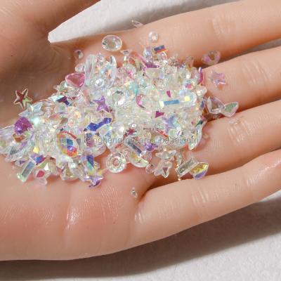 China Nail Art Decoration Hot Selling New Aurora Nail Art Diamond Decoration Nail Art Aurora Drill Transparent Drill Shaped Pole light rhinestones for sale