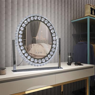 China Oval Shape Design Luxury LED Lighted Desk Lit Vanity Cosmetic Makeup Crystal Mirror for sale