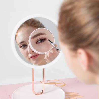 China Ballet Design 6000 Mah Battery Magnetic 7X Lighted Magnification Led Lights Adjustable Makeup Mirror With Folding Stand for sale