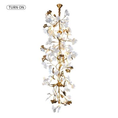 China Newest style modern chandelier DIY ginkgo pendant lamp ceramic shape led lamp stair lamp for villa for sale