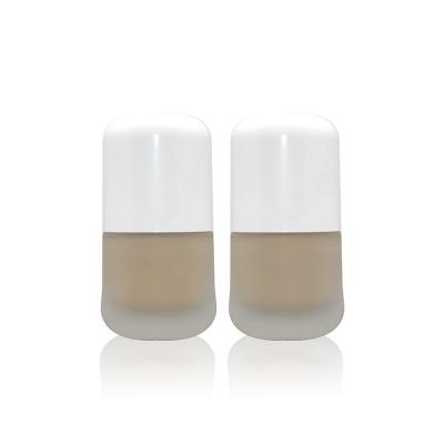 China Personal Care 30ml Capsule Foundation Bottle Liquid Face Cream Frosted Package Lotion Glass Cosmetic Bottles for sale