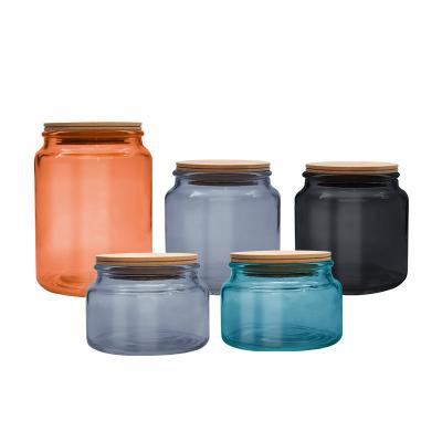 China Wholesale Home Decoration Glass Food Storage Jars Airtight 500ml Kitchen Empty Storage Glass Jars Colored Glass Jars With Bamboo Lid for sale