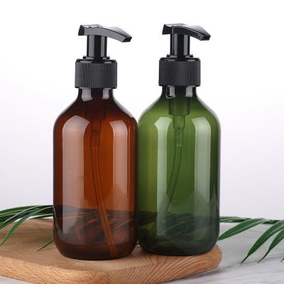 China Wholesale Personal Care 300ml 500ml Green And Brown Transparent Glass Press Pump Bath Bottle for sale