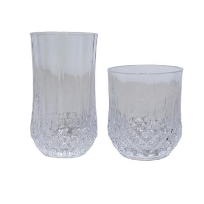 China New Custom Red Wine Transparent Wholesale Classic/Postmodern Champagne Tea Glass Relief Design Wine Glass for sale