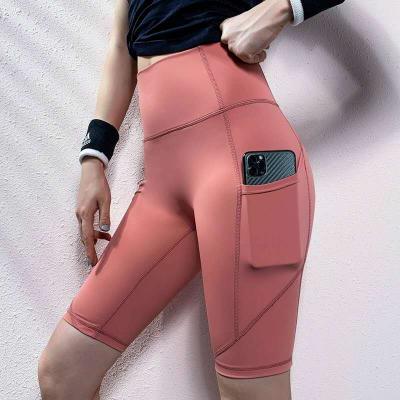 China Solid Color Breathable Women's Yoga Short Side Pockets Volleyball Workout Stretch Waist Short Pants Dance High Soft Solid Running for sale