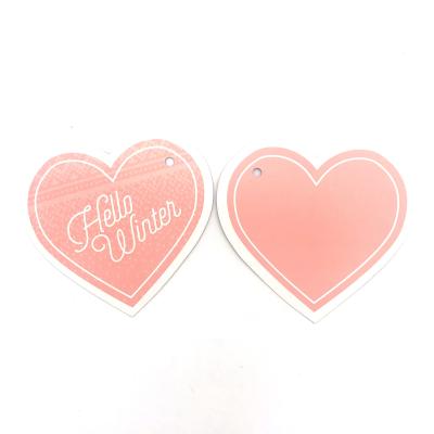 China Sustainable Custom Die Cut Hang Tag Pink Heart Shape Hang Tag For Women's Clothes for sale