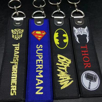 China Sew On Woven Logo Keychain Woven Jet Tag Woven Key Chain Cheap Custom Fabric Woven Key Chain Fashion for sale