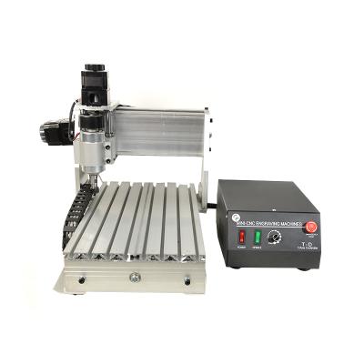 China Construction worksÂ   3020T-3 Small CNC Router Casting Iron Machine with Automatic Tool Change Rotary Spindle for sale