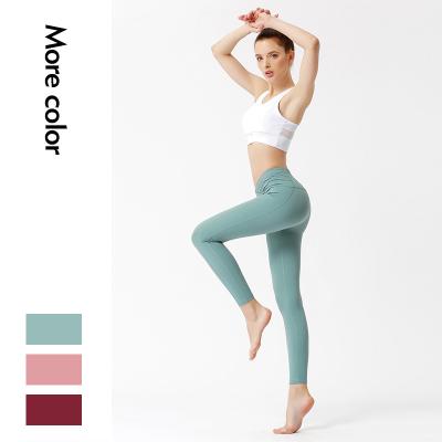 China Yoga Plus Size Young Girls Pants Solid Color Sports Leggings Fitness Women for sale