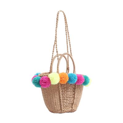 China Fashion Summer Beach Shoulder Bag Straw Basket Tote Hand Bag Eco-Friendly Paper Handbag With Pom Pom for sale