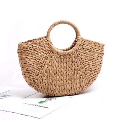 China Fashion Bohemian Style Straw Hand Bags Beach Tote Natural Handmade Woven Bag For Women for sale