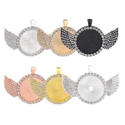 China Vintage 25mm 30mm White Rhinestone Wing Sublimation Charms Hip Hop Style Necklace Pendants Framing Trays Volume for sale