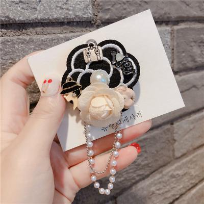 China DIY Jewelry Accessory Fashion Brooch Korean Pearl Camellia Flower Brooch for sale