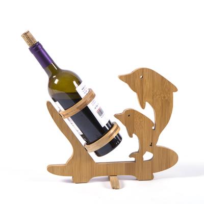 China New Design Viable Wine Display Stand Dolphin Shaped With Movable Circle Bamboo Wine Bottle Holder for sale