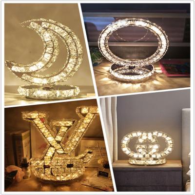 China Modern New Style LED Desk Reading Lamp Luxury Creative Transparent Crystal Table Lamp for sale