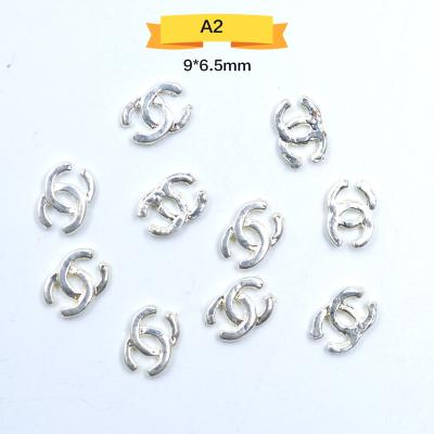 China 100pcs/bag Rhinestone Logo Nail Art Accessories Manicure Stickers For Woman Metallic Sticker for sale