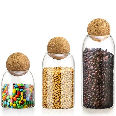 China High Borosilicate Glass Candy Jars Sustainable Kitchen Food Storage Jars Airtight Canisters With Lid Wooden Ball for sale