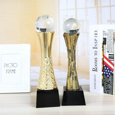 China Custom Europe Gold Soccer Trophies Sporting Events Awards Resin Soccer Trophy With Crystal Ball for sale