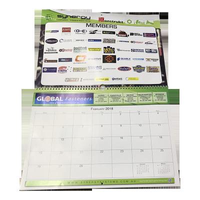 China 100% eco-friendly 2018 new design cheap colorful saddle stitch custom wall calendars printing with hole for sale