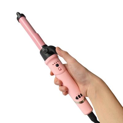 China Liquid crystal intelligent control automatic rotating curling iron, dry and wet hair with environmentally friendly alloy for sale