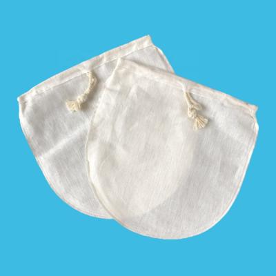 China Hotels Sopurrrdy No Harmful Chemical Organic Cotton Nut Milk Bag With Cotton Drawstring for sale