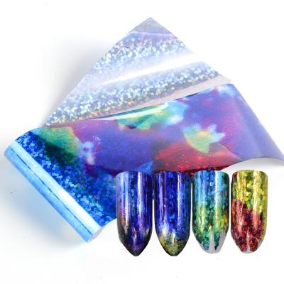 China 2021 New Eco-friendly Style Mix Colors Nail To Foil Sticker Transfer Designers Star Sky Laser Nail Art Sticker With Colorful Paper msds for sale