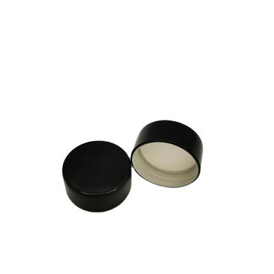 China Non Spill 28/400 Black Coated Aluminum Plastic Combo Caps For Champagne Wine Bottle for sale