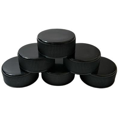 China Non Spill Black Plastic 28/410 Screw Cap With Soft Liner Closure For Glass Vial for sale