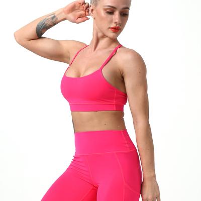 China Best Selling Breathable Red Pink Tops And Gray Black Suit Supporting Workout Gaiters Set Sexy Women Yoga Wear Sports Bras for sale