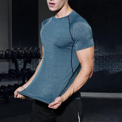 China Anti-wrinkle Sports T-shirt Men's Loose Short-Sleeved Quick-Drying Clothes for sale